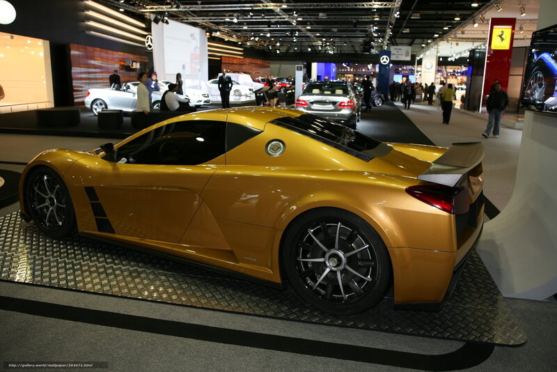 Golden sports car at auto show