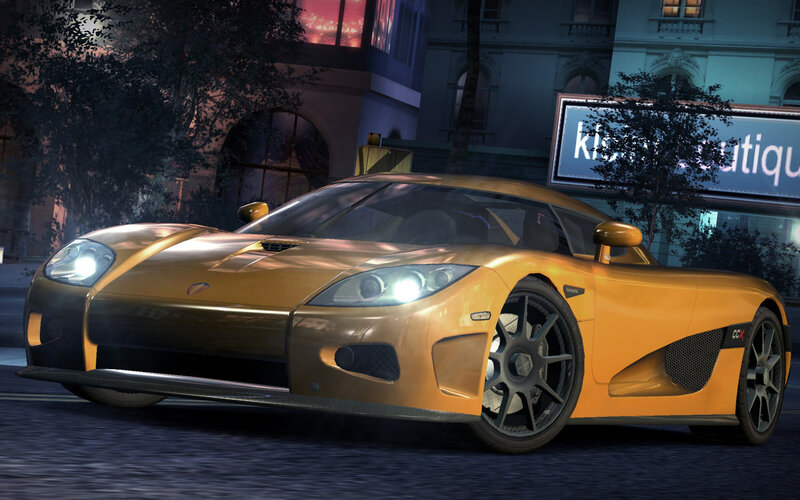 golden sports car at night