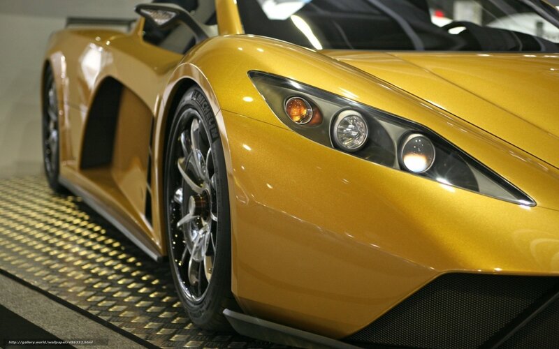 golden sports car front view