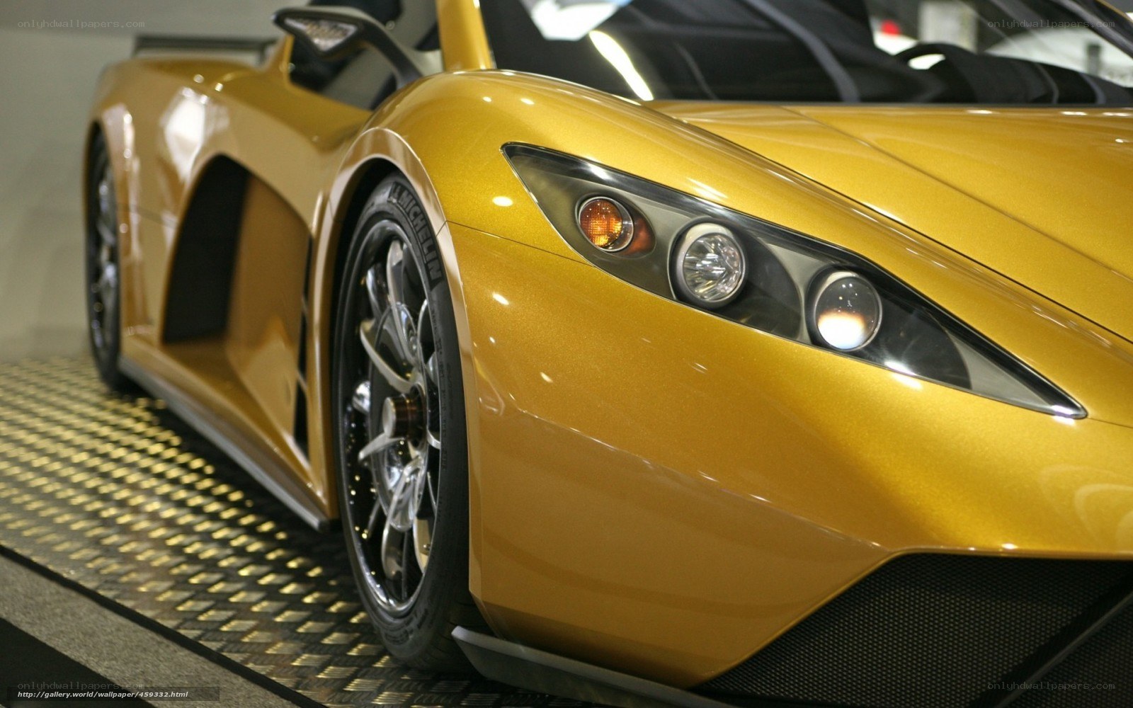 golden sports car front view