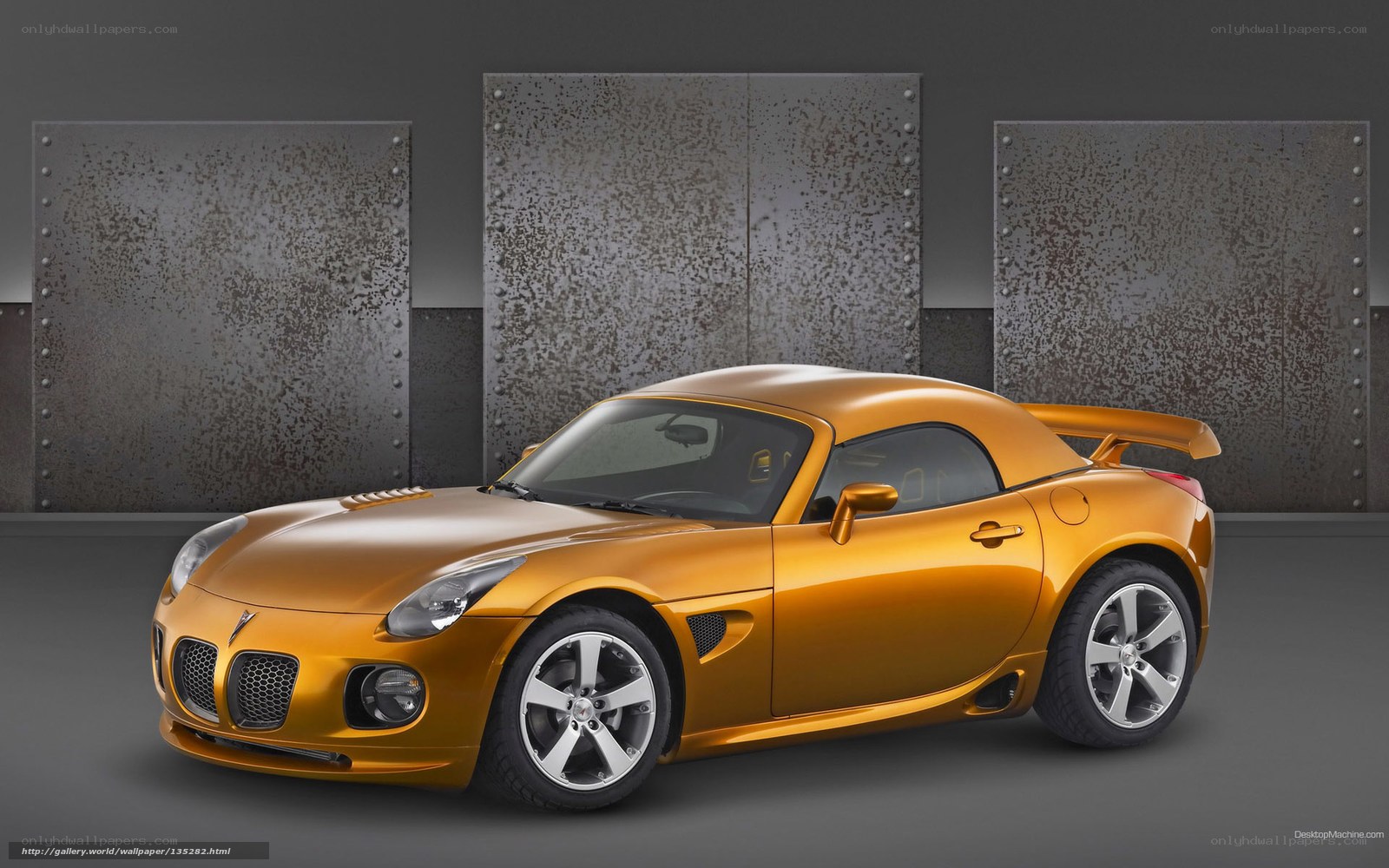 golden sports car in studio