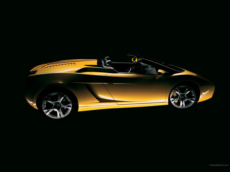 golden sports car on black