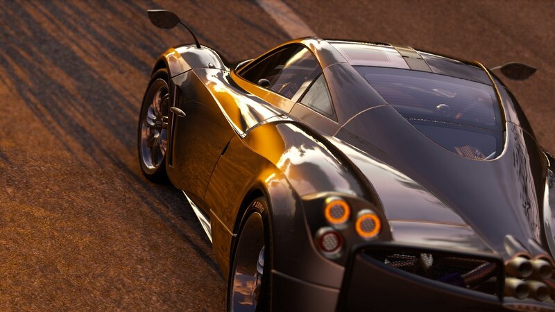 golden sports car on track