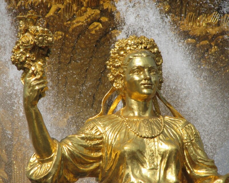 Golden statue at a fountain