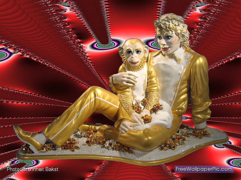 Golden Statue of Man and Monkey