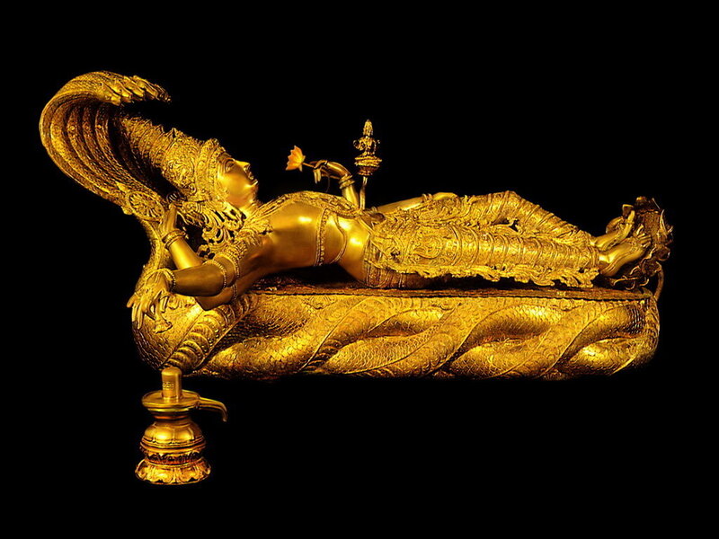 Golden Statue of Reclining Deity — Gold