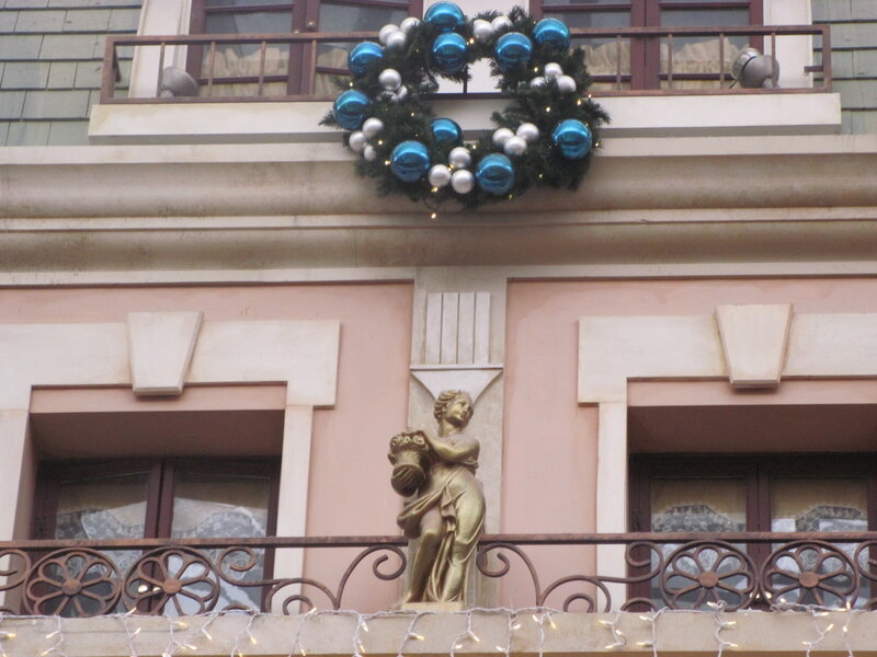 Golden Statue on Balcony