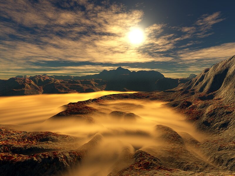 Golden sunrise over alien mountains