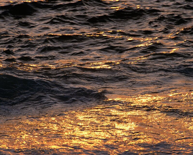 golden sunset on ocean waves
