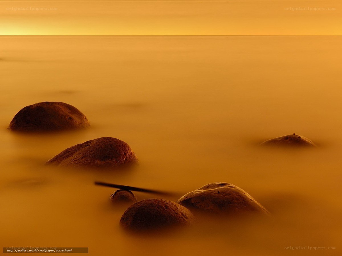 Golden sunset over calm sea