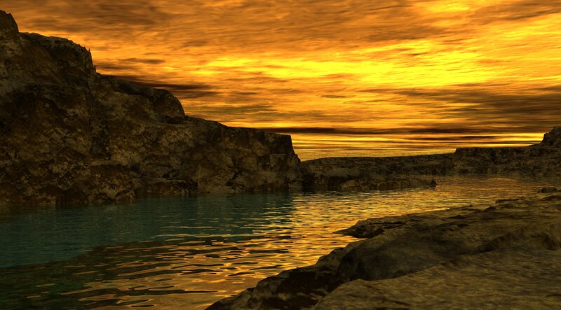 Golden sunset over rocky coast