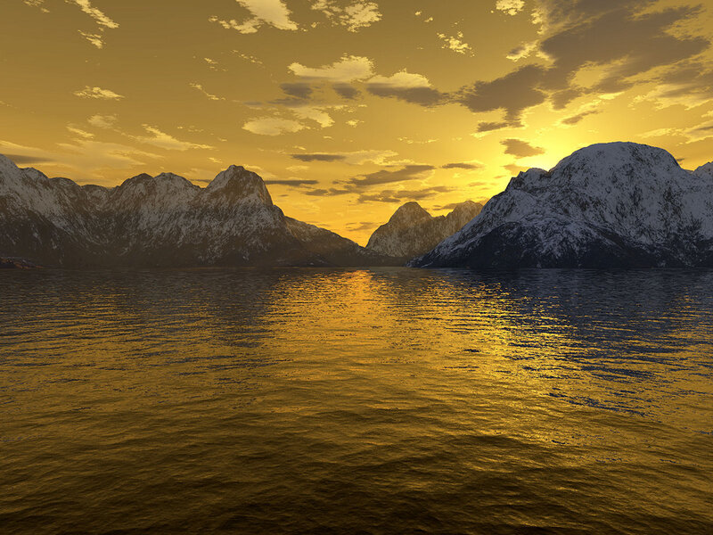 Golden sunset over snowy mountains