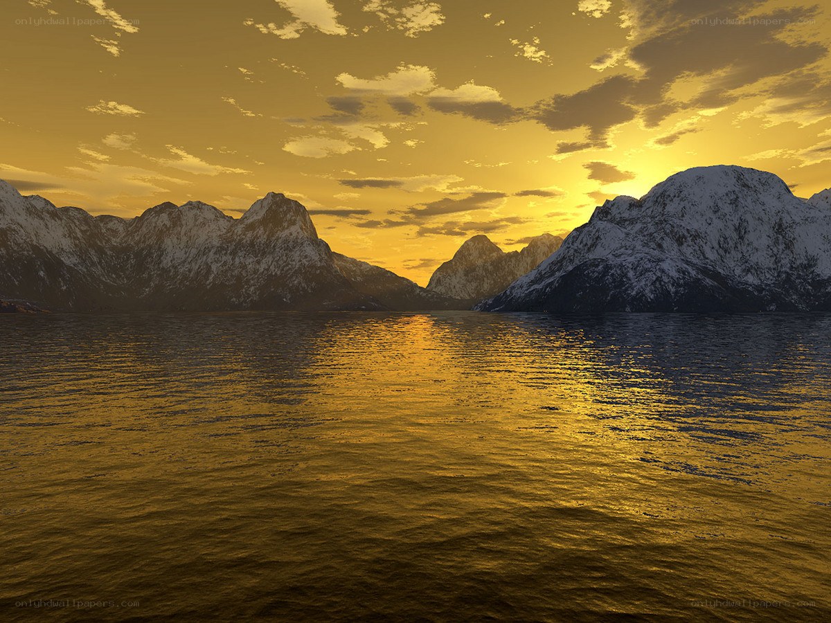 Golden sunset over snowy mountains