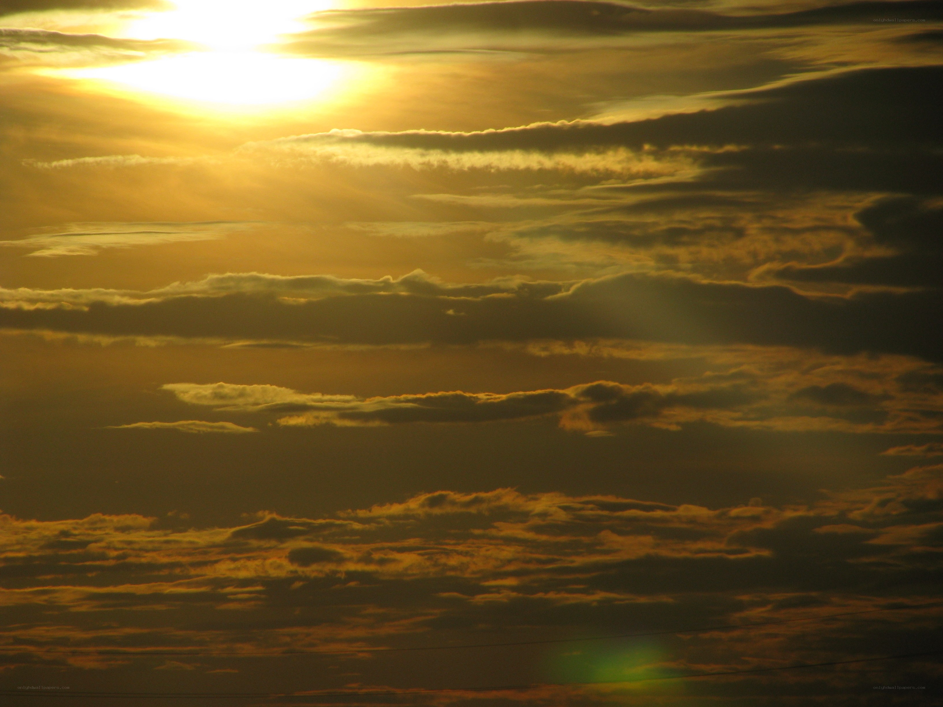 Golden sunset with clouds