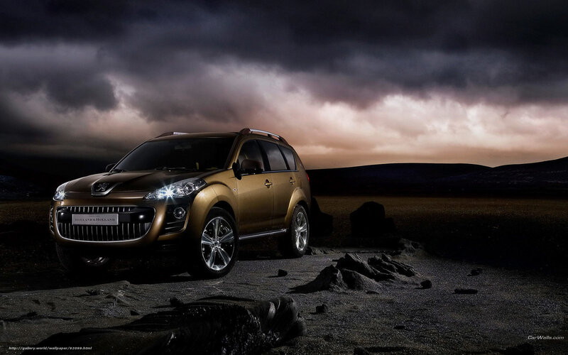 Golden SUV in stormy landscape