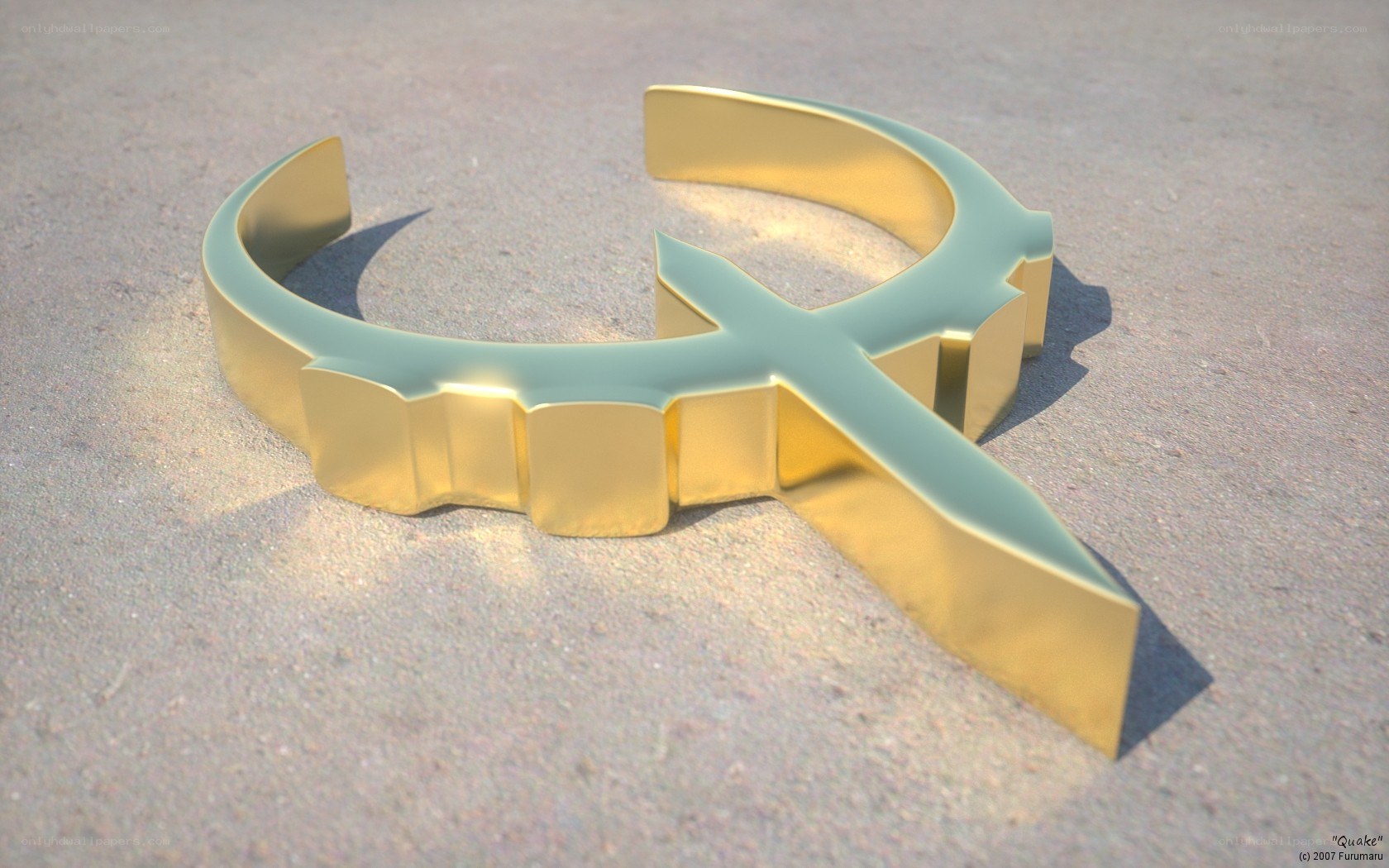 golden symbol on sand