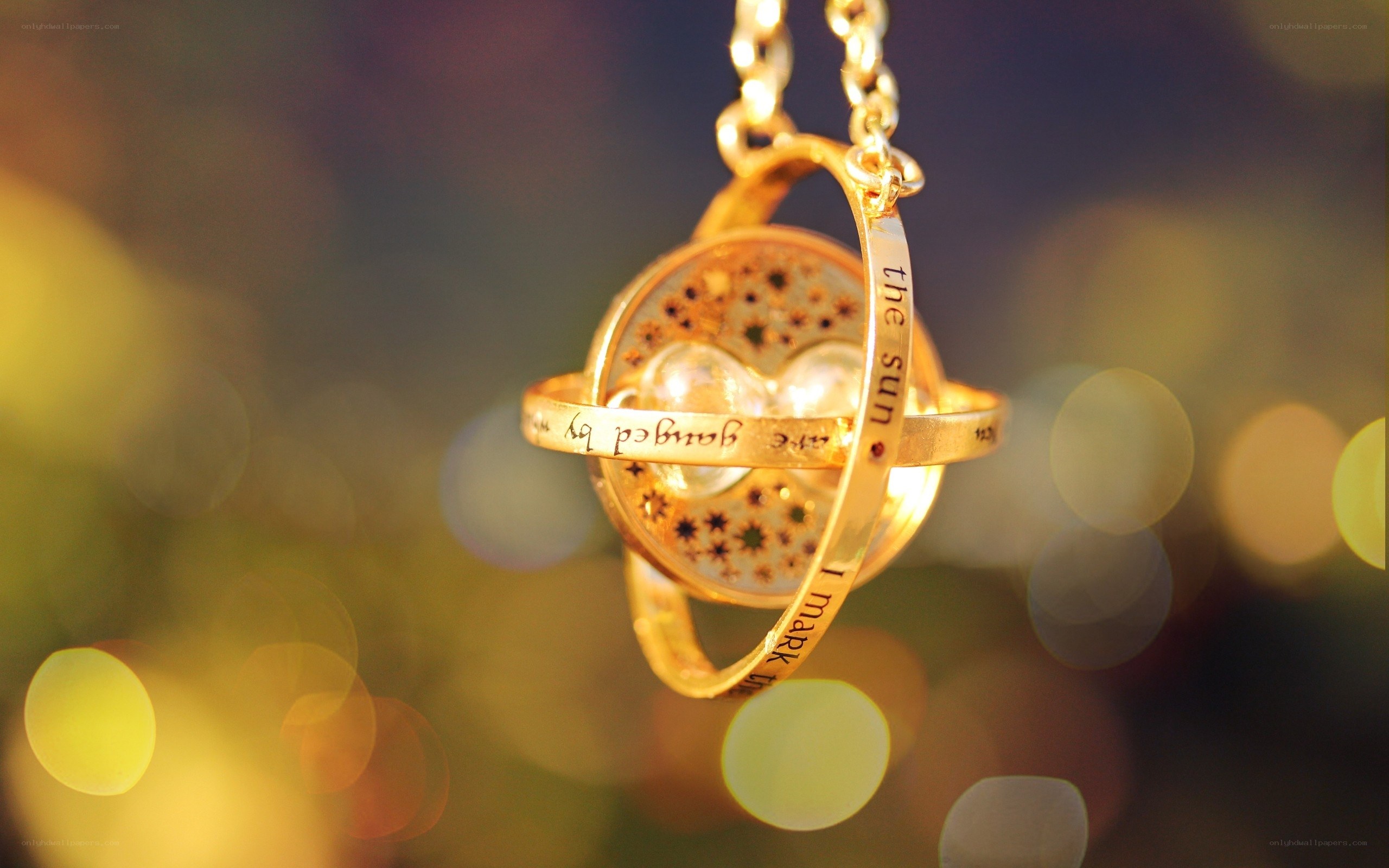 Golden time-turner pendant