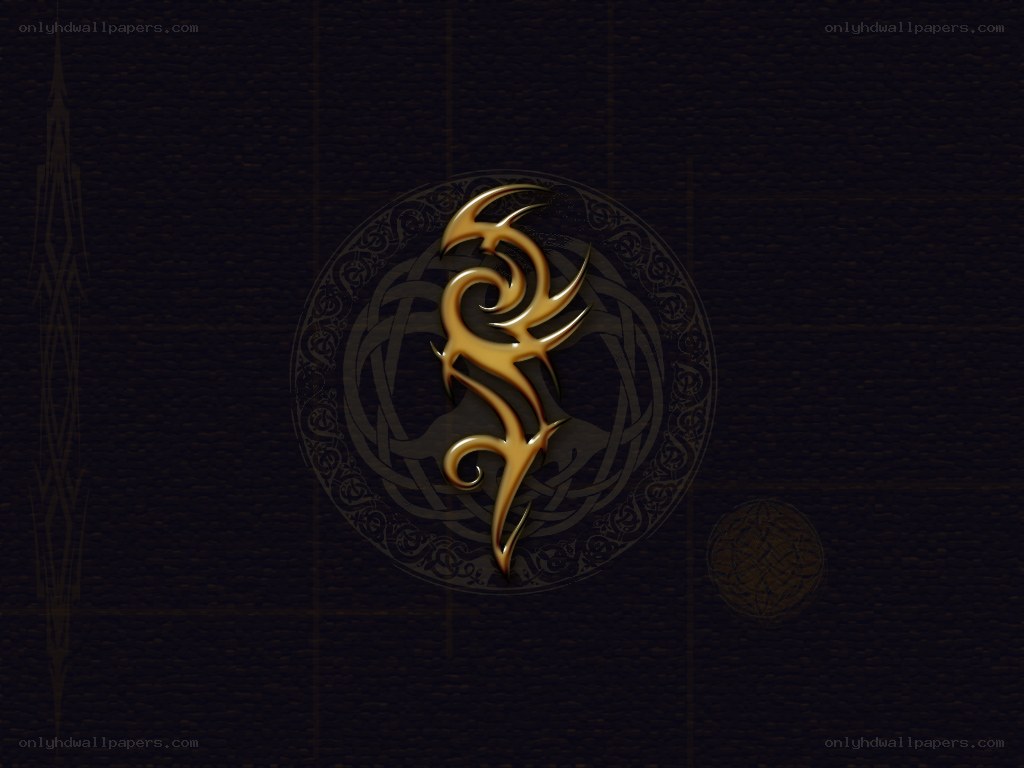golden tribal symbol on dark background