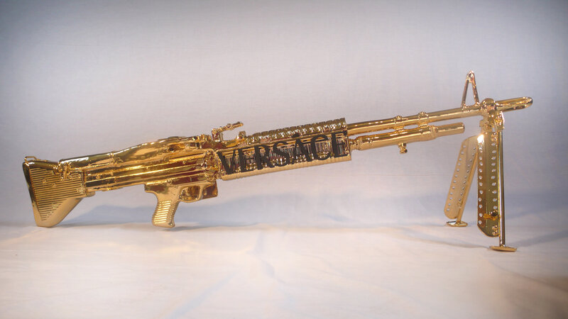 Golden Versace machine gun