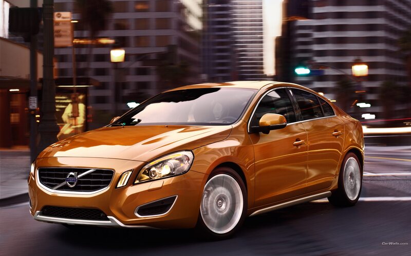Golden Volvo S60 in city