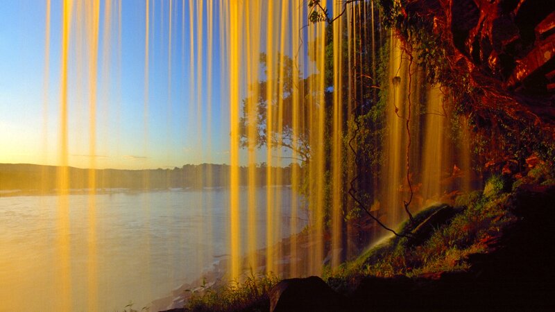 Golden Waterfall at Sunset