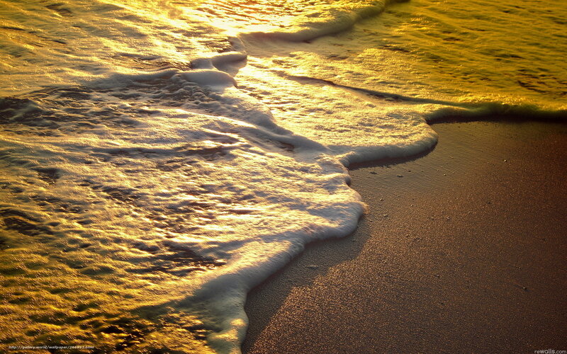 Golden waves at sunset