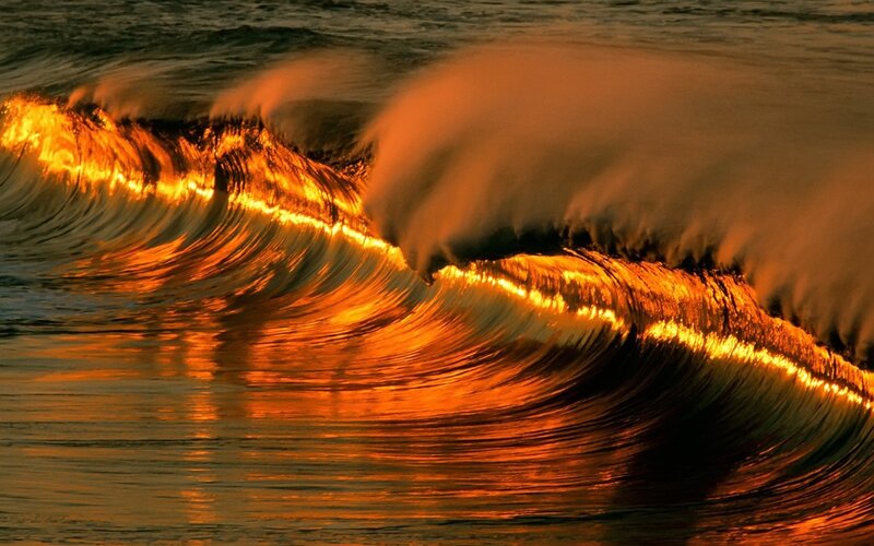 Golden waves at sunset