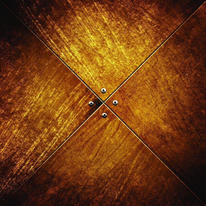 Golden wooden floor with screws