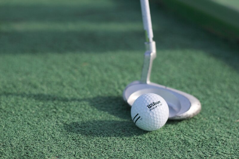 Golf Ball and Putter — Green