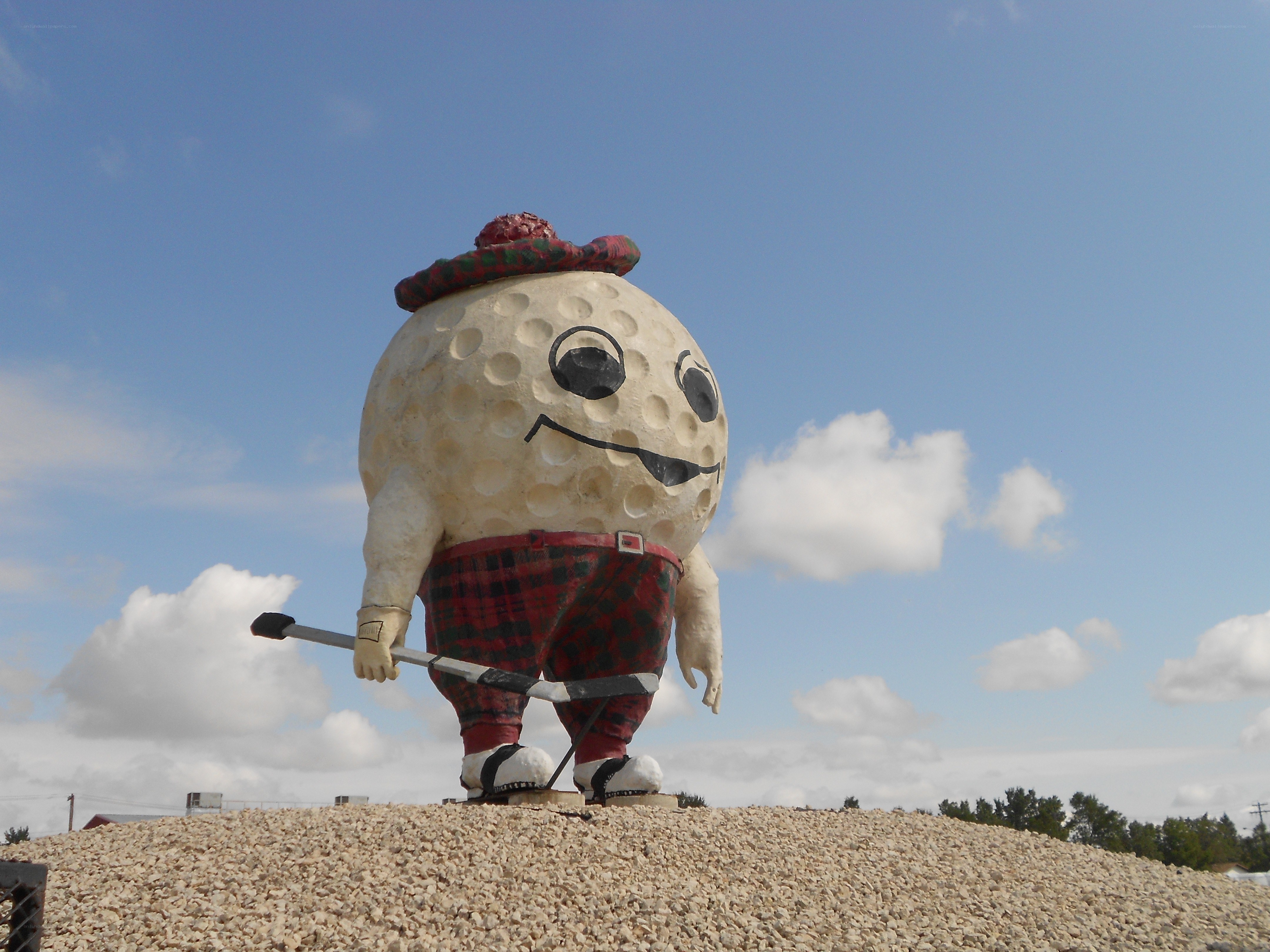 golf ball mascot statue