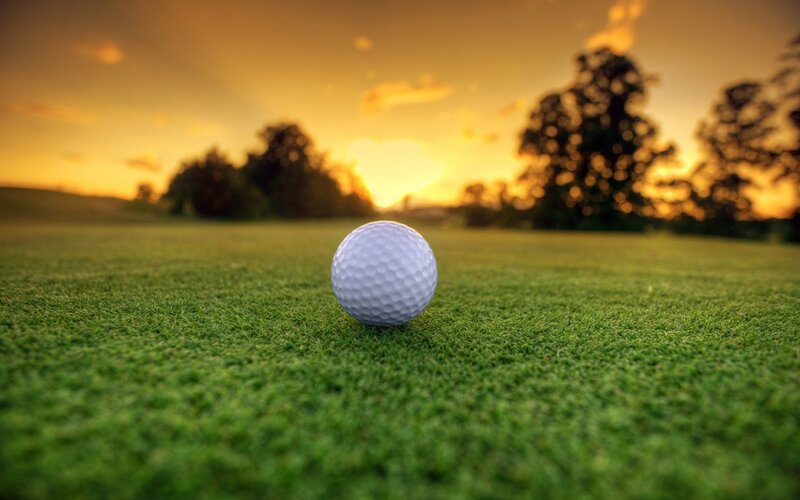 Golf Ball on Green — Serene, Sunset