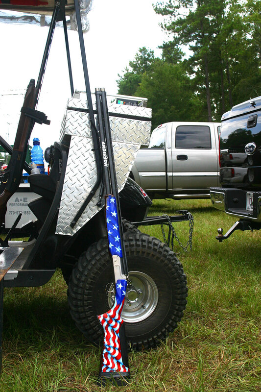 Golf cart with patriotic rifle