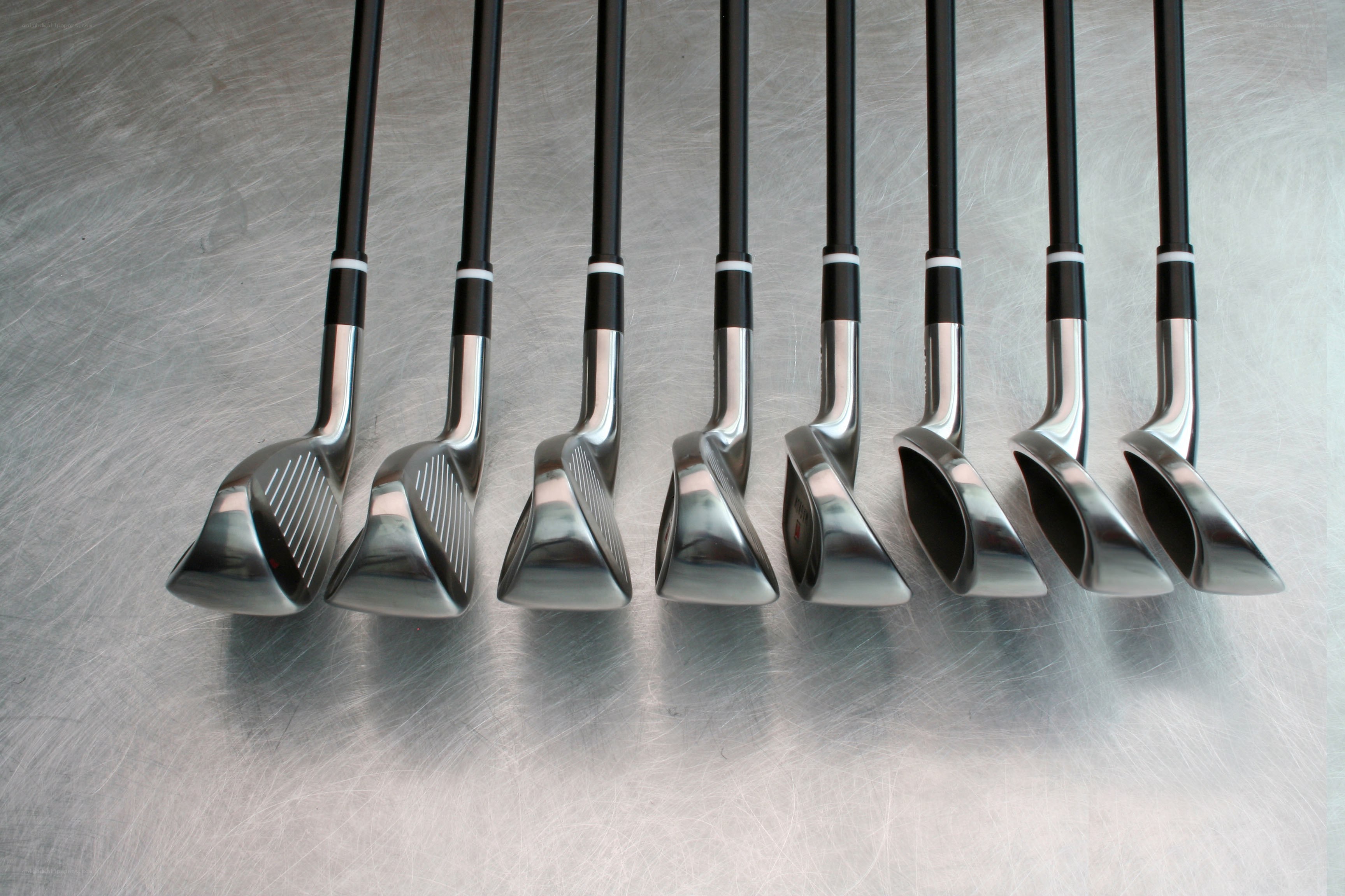 golf clubs in a row