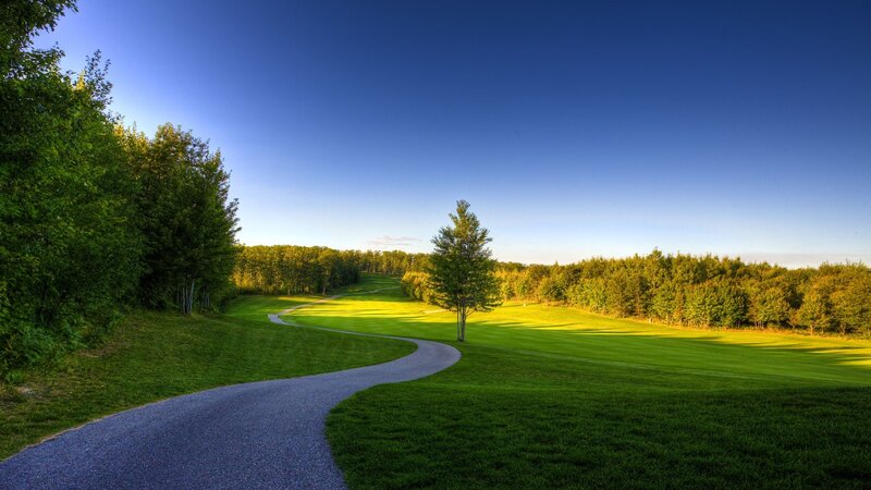 Golf course path at sunset