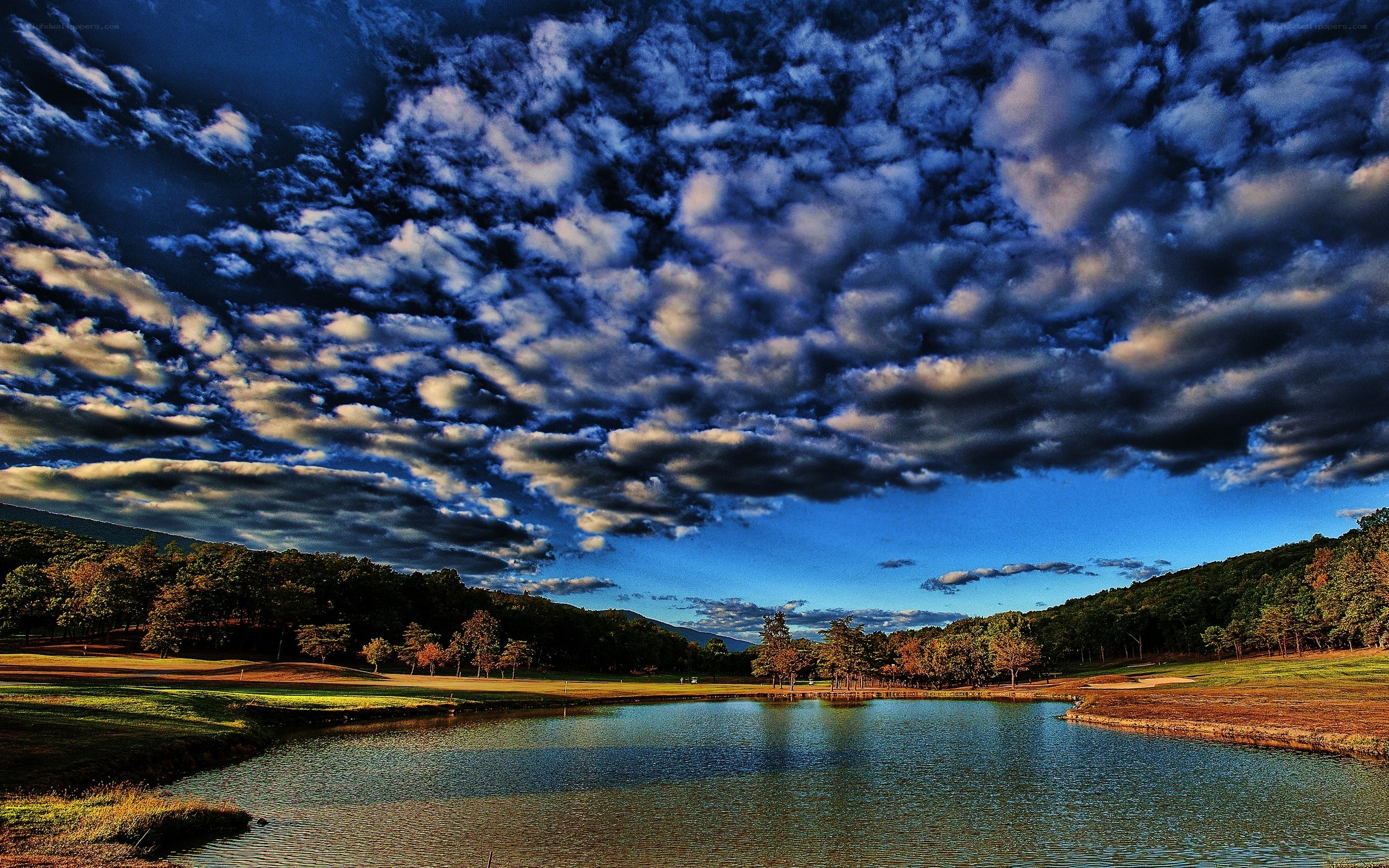 Golf course with dramatic sky