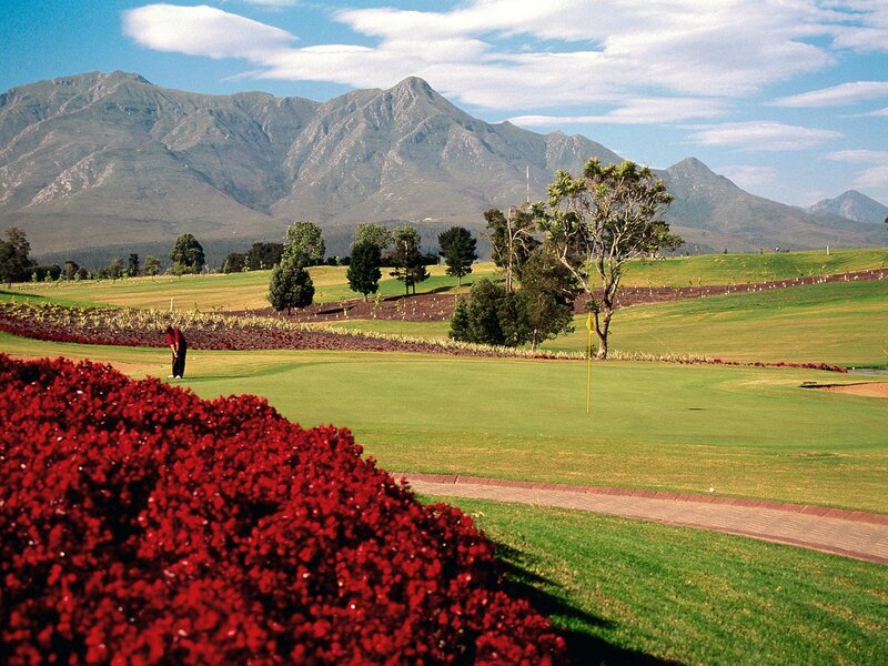 Golf course with mountain backdrop