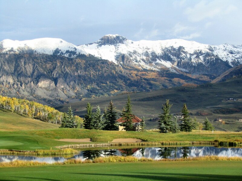 Golf course with mountain backdrop
