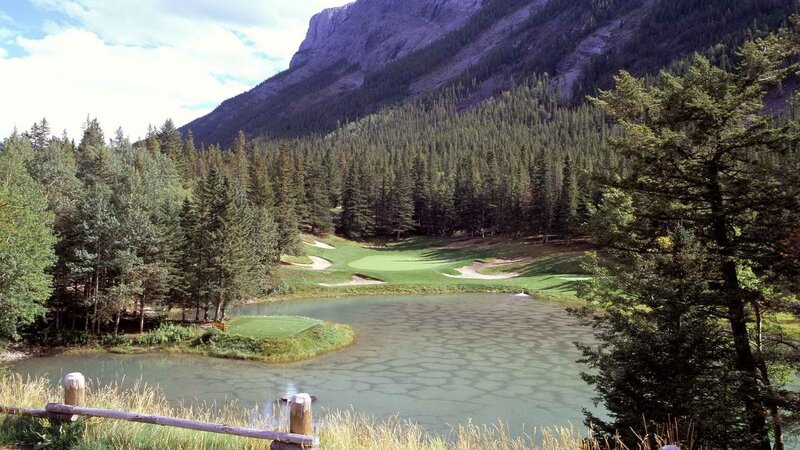 Golf course with mountain backdrop