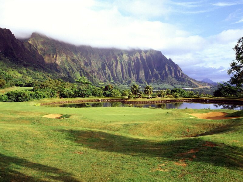 Golf course with mountain backdrop