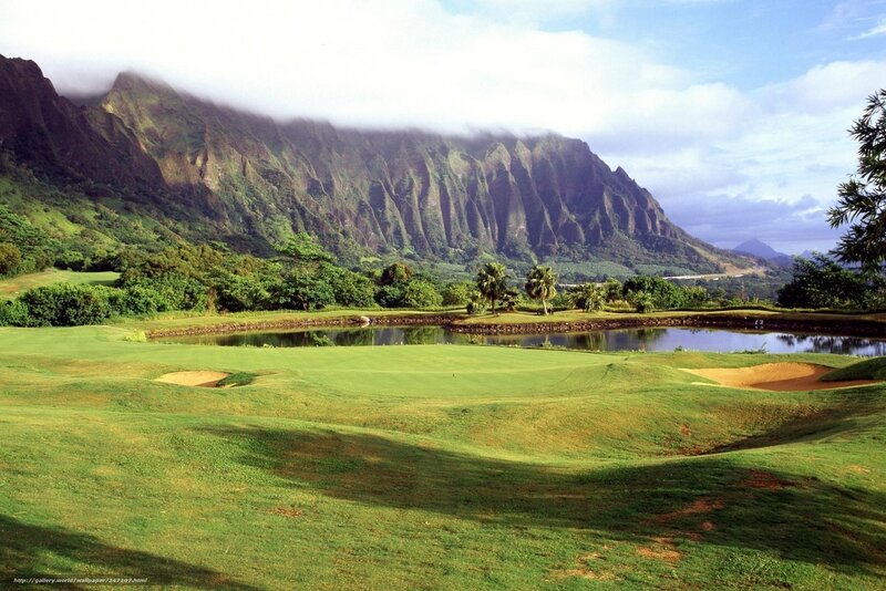 Golf course with mountain backdrop