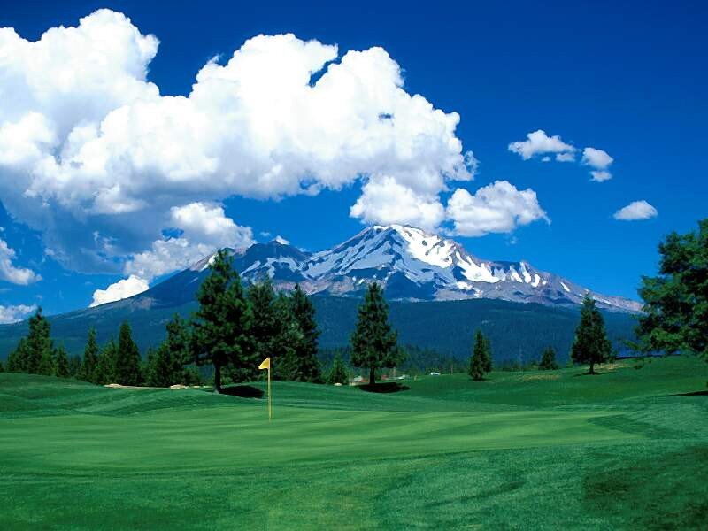 Golf course with mountain view