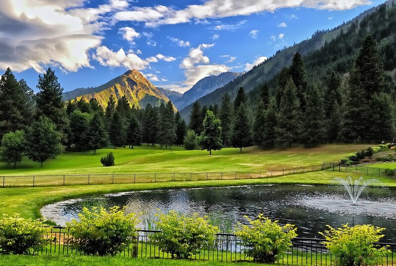 Golf Course with Pond — Green, Serene, Afternoon, Photograph, Mountains, Trees, Fountain, Blue