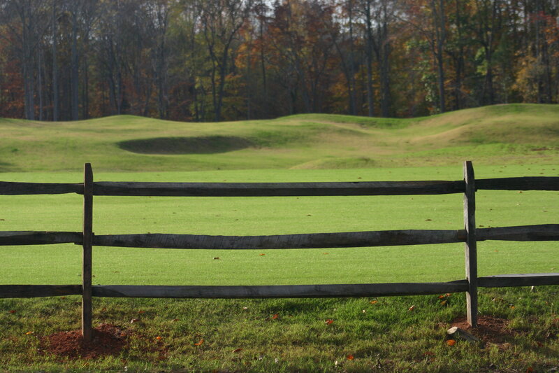 Golf Course with Wooden Fence