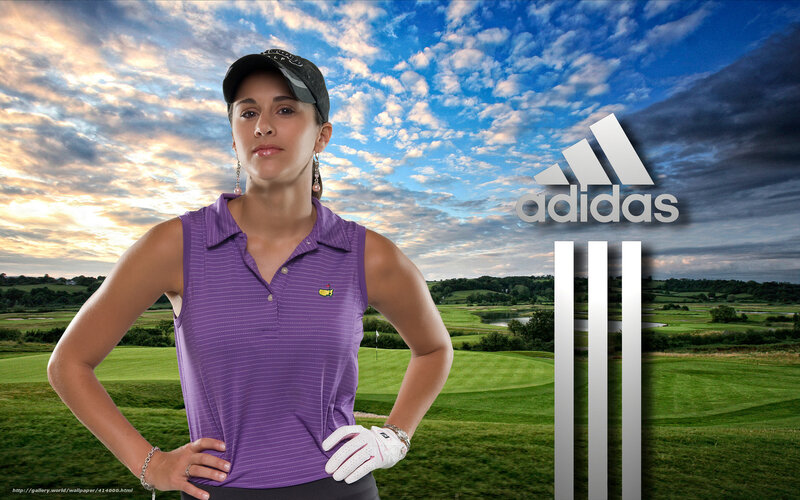 Golfer in purple shirt