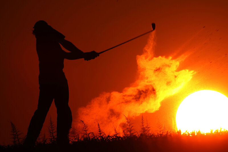 Golfer Swinging Club — Orange