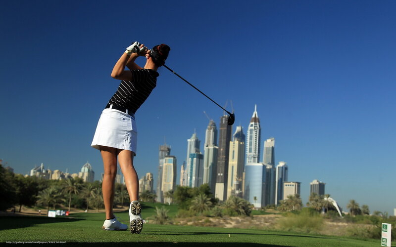 Golfer with city skyline