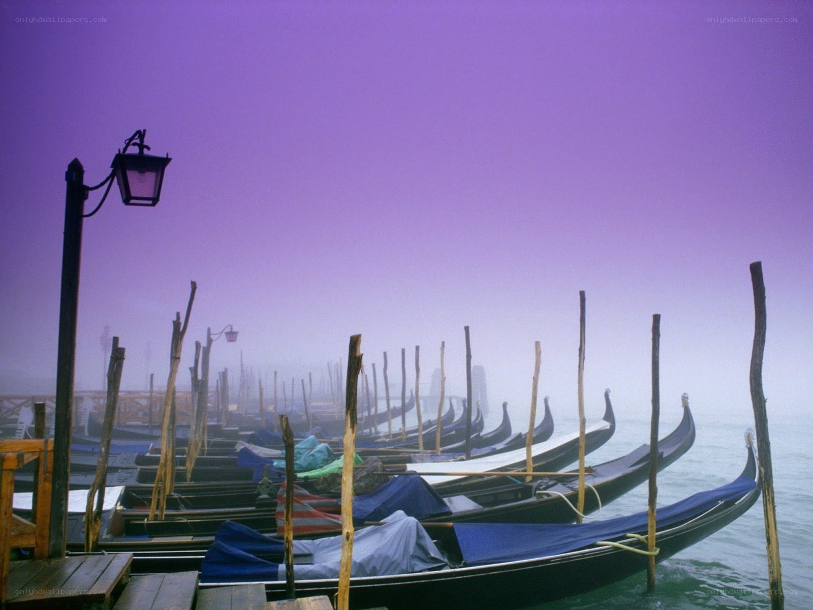 Gondolas in Venice at dawn