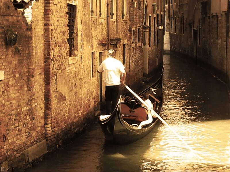Gondolier in Canal
