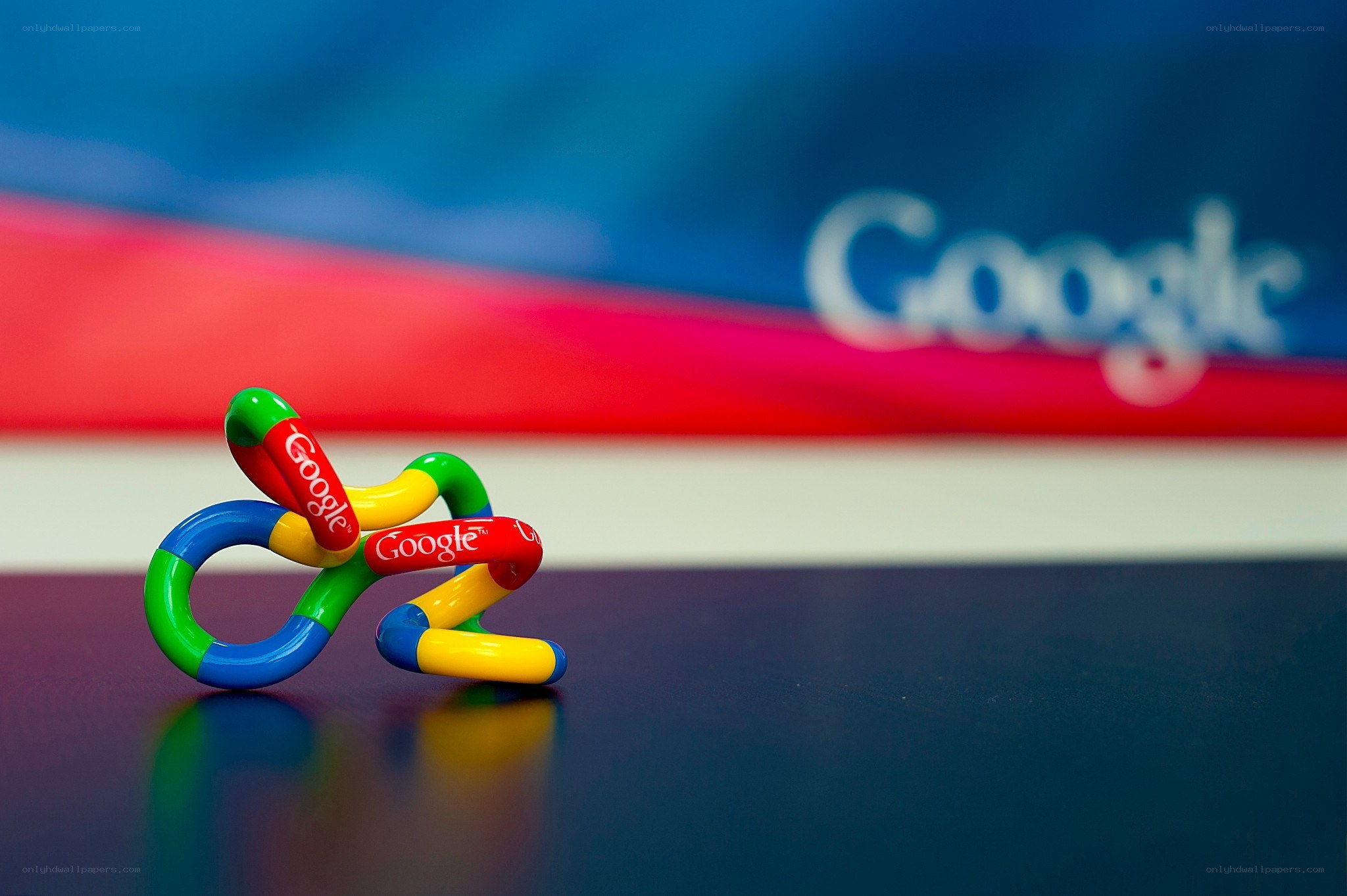 Google logo toy on desk