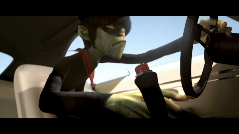 gorilla driving a car
